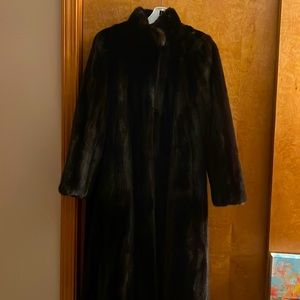 Black mink coat bought at Neiman Marcus for 4000.00 with matching hat.